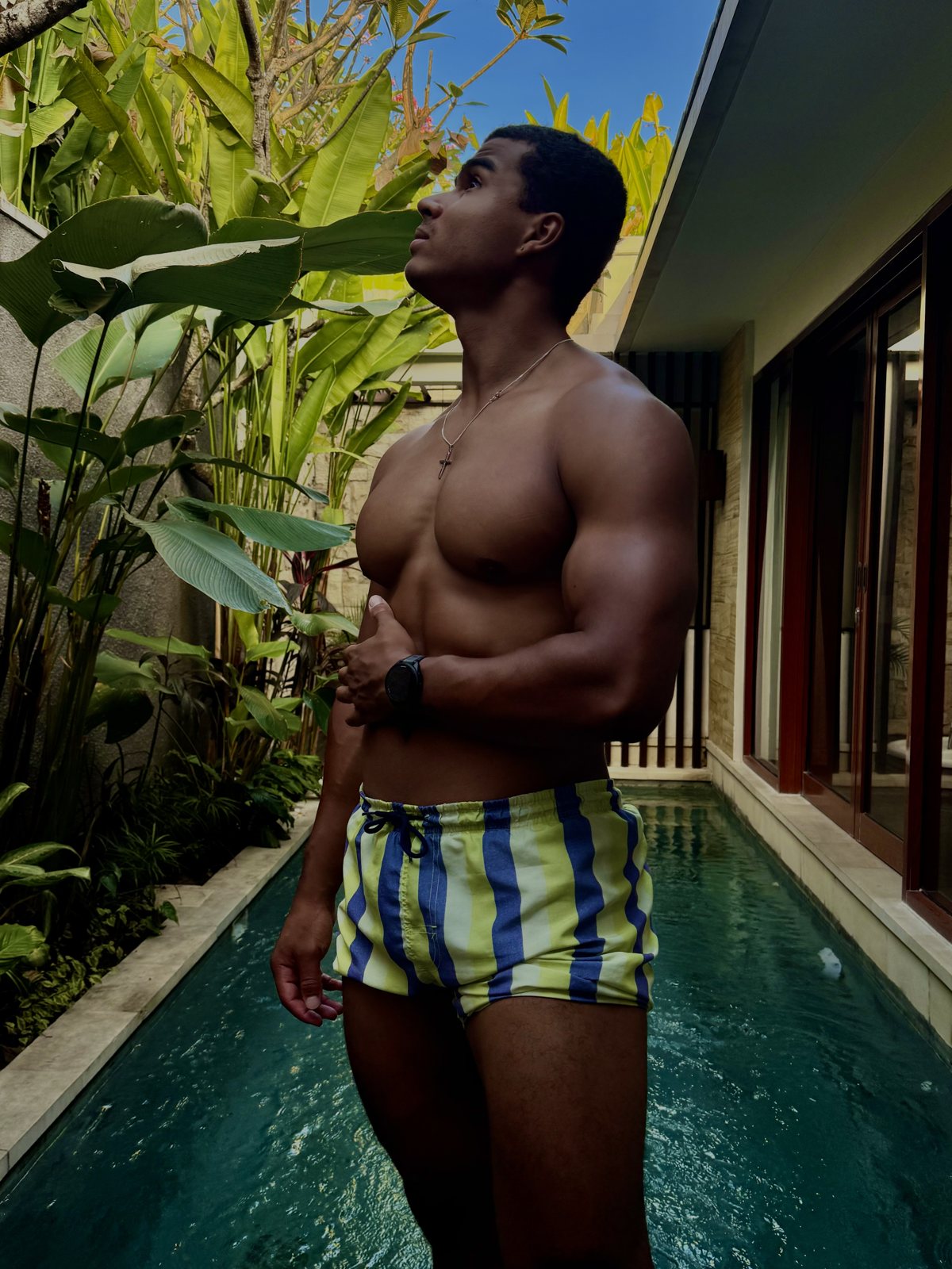 Maximus in Bali by a villa pool, current athletic physique