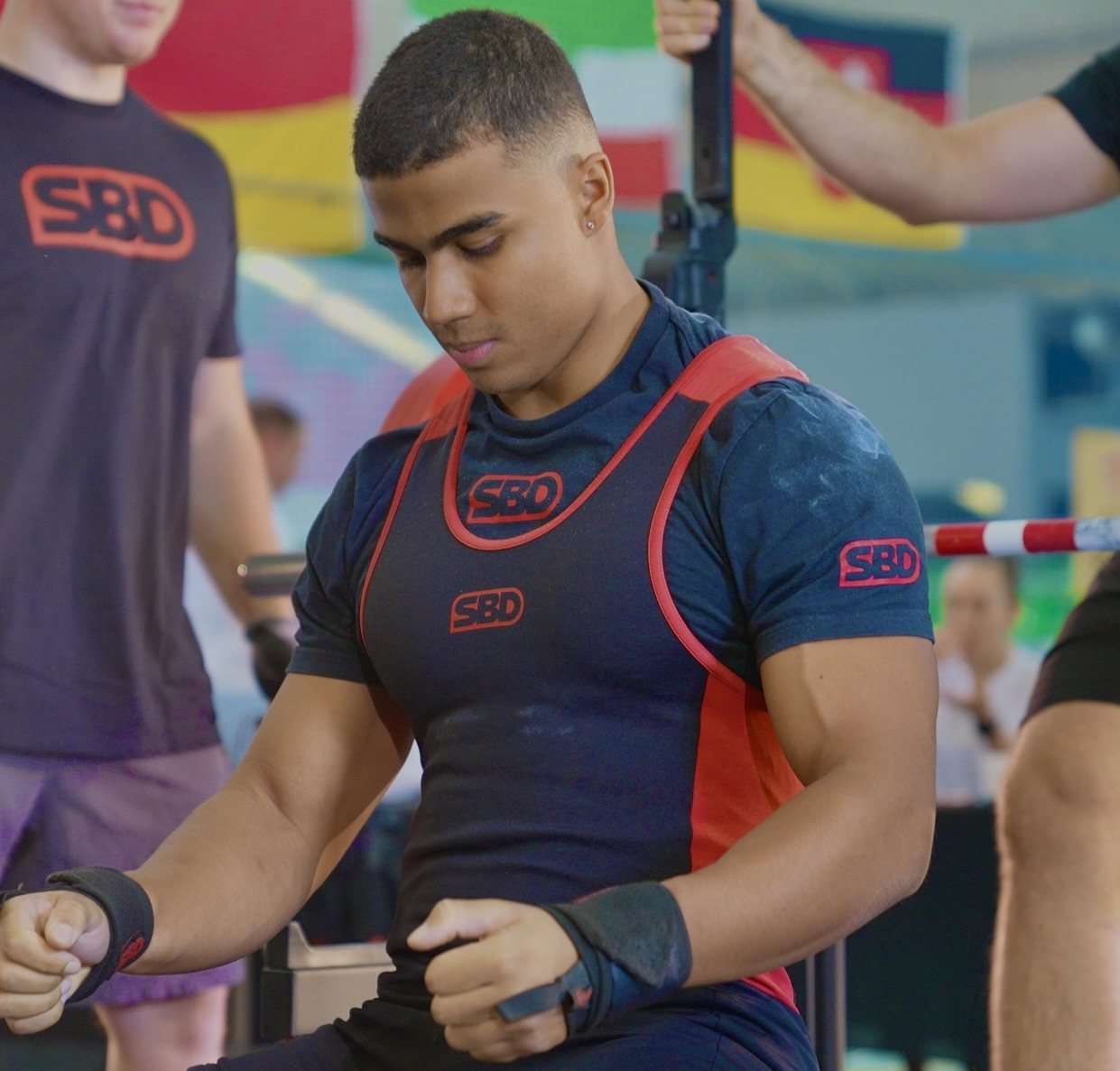 Maximus Glover in SBD gear, focused before his bench attempt at the German Nationals
