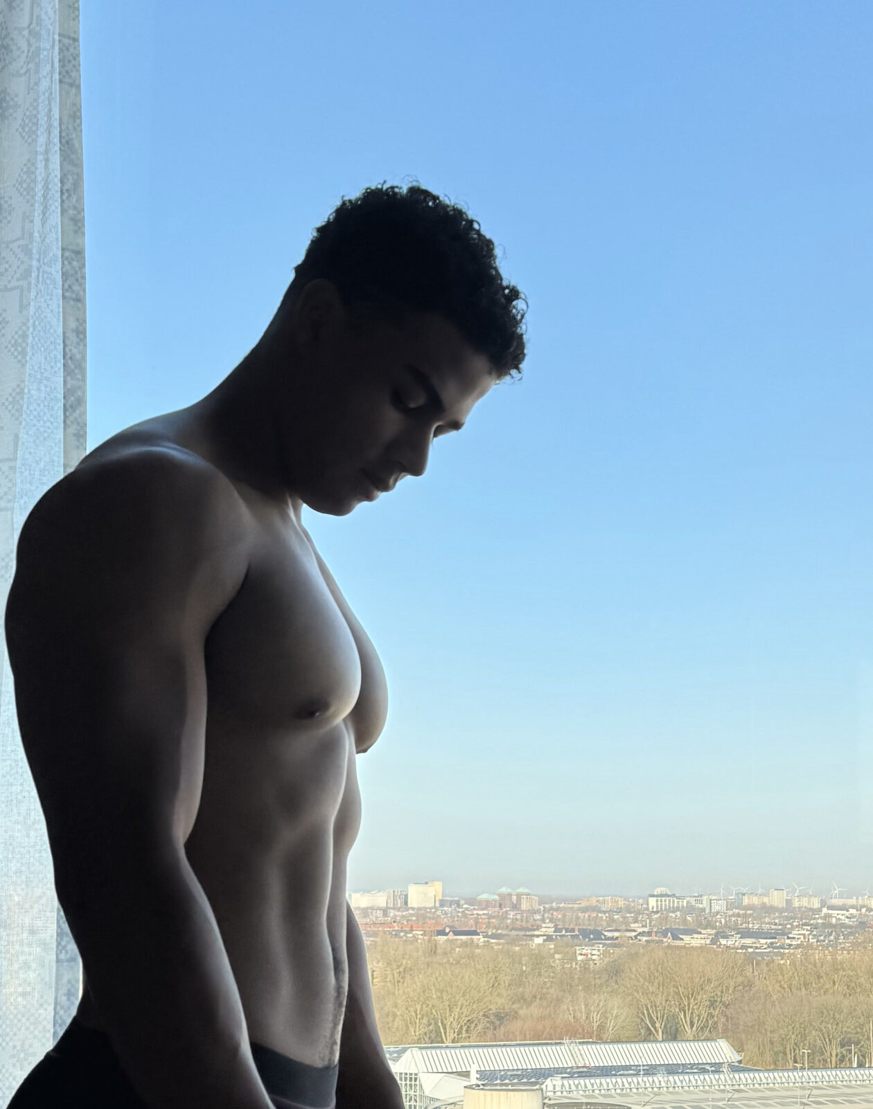 Maximus Glover, athlete portrait in natural window light